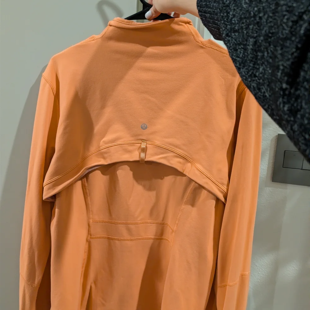 Lululemon Athletica Define Luon Orange Jacket